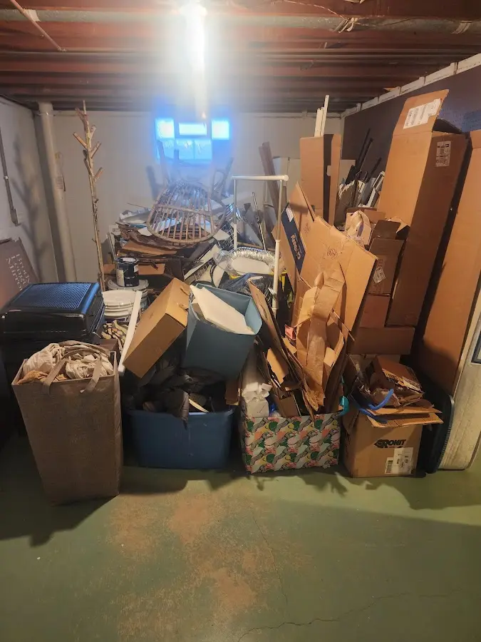 Roll-off dumpster container at job site for 2 Yard Dumpster Rental in Kenneth City